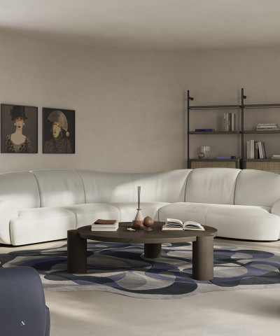 The new Memoria sofa designed by Karim Rashid  for Natuzzui Italia is made of soft curves  and sinuous lines, wants to emphasize  the beauty of the encounter and the sweet fluidity of human relationships